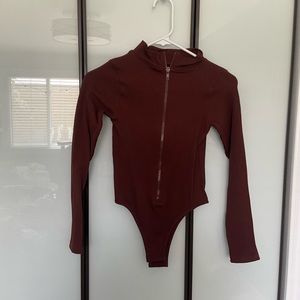 PRETTYLITTLETHING brown zipper bodysuit